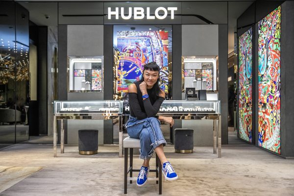 Model and triathlete Kelly Tandiono sports the Hublot Classic Fusion Orlinksi Blue Ceramic