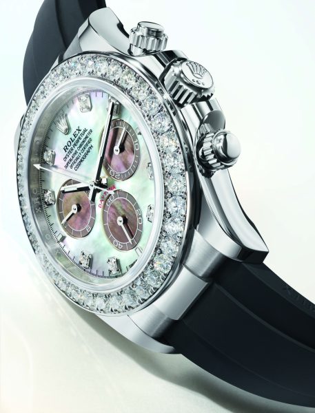 Counters featuring contrasting black mother of pearl enhance the watchs appeal